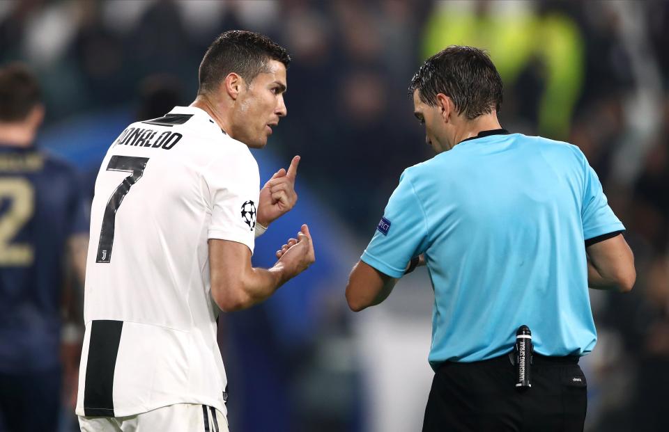  Cristiano Ronaldo argues with the ref in a hard-fought first-half