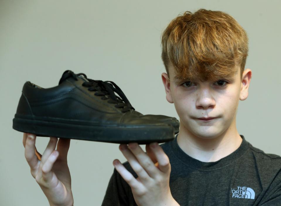  A schoolboy who was put in isolation for wearing trainers to school has said the 'unfair' treatment is affecting his education