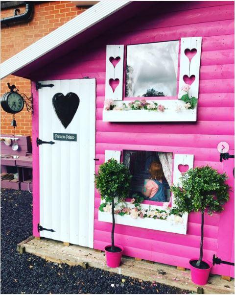 Luisa's children also have an enviable playhouse in the garden
