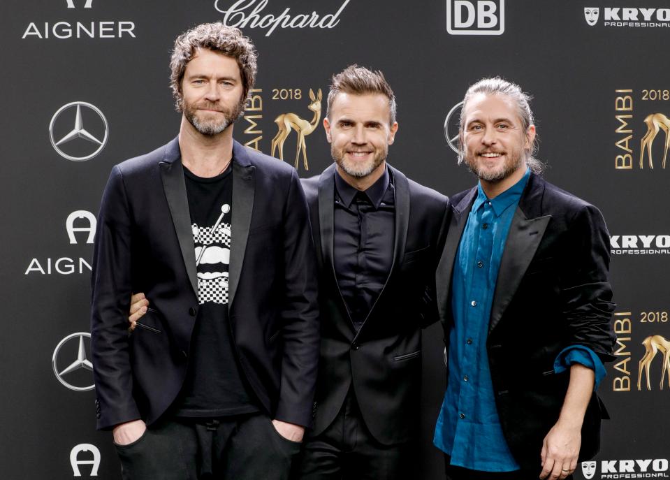  Take That's Howard Donald, Gary Barlow and Mark Owen attend the 70th Bambi Awards at Stage Theater on November 16, 2018 in Berlin, Germany