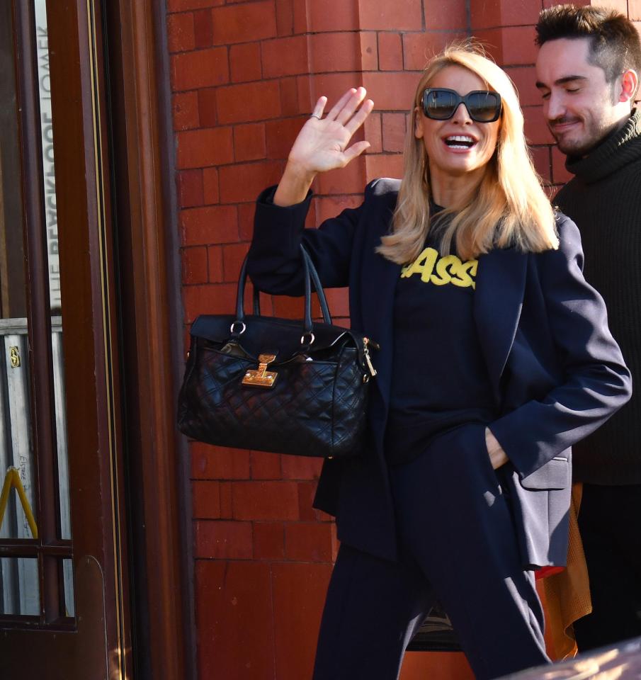  The star looked like an absolute dream in her suit and shades