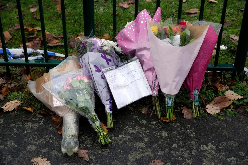  Flower tributes left at the scene of the 65-year-old's death