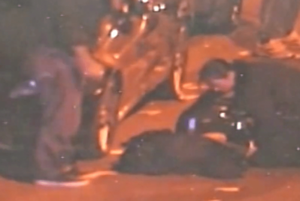  A fellow officer tends to the mowed down Pc Foran