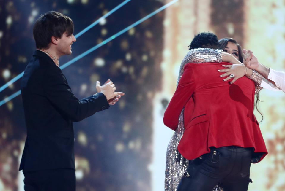  He hugged runner up Scarlett Lee as the crowds at Wembley Arena gave him a standing ovation