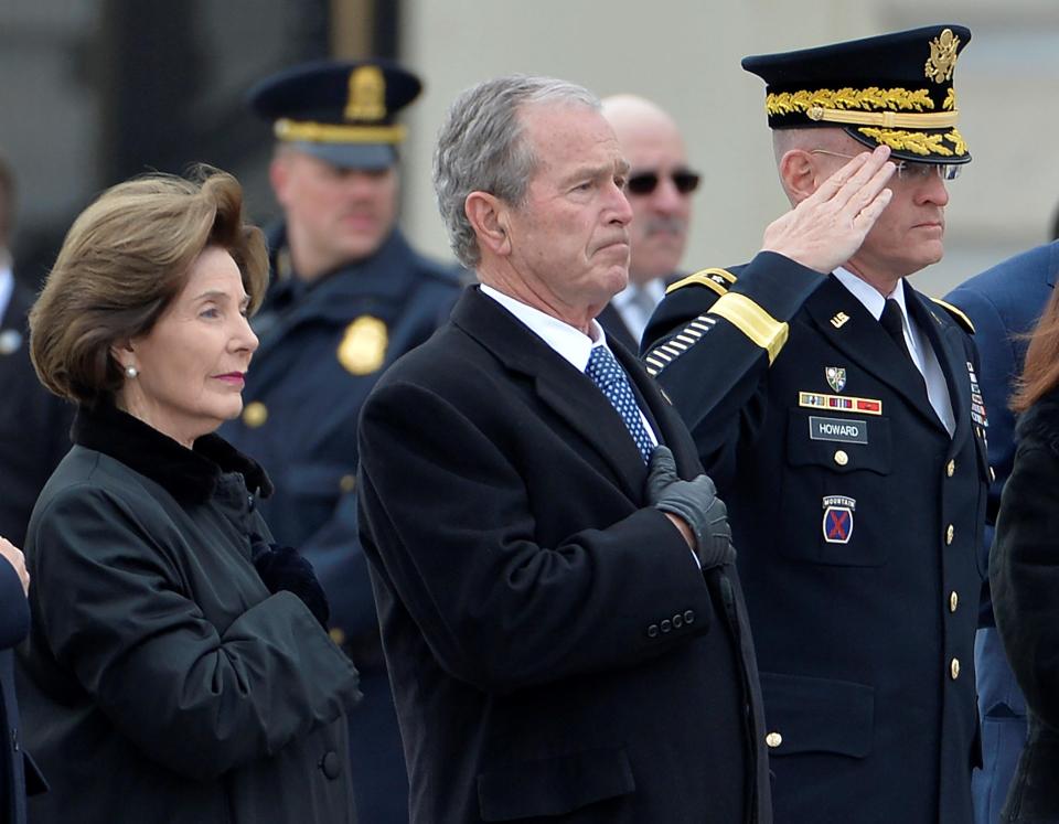  Former president George W Bush, who is joined by his wife Laura, is expected to give a eulogy today
