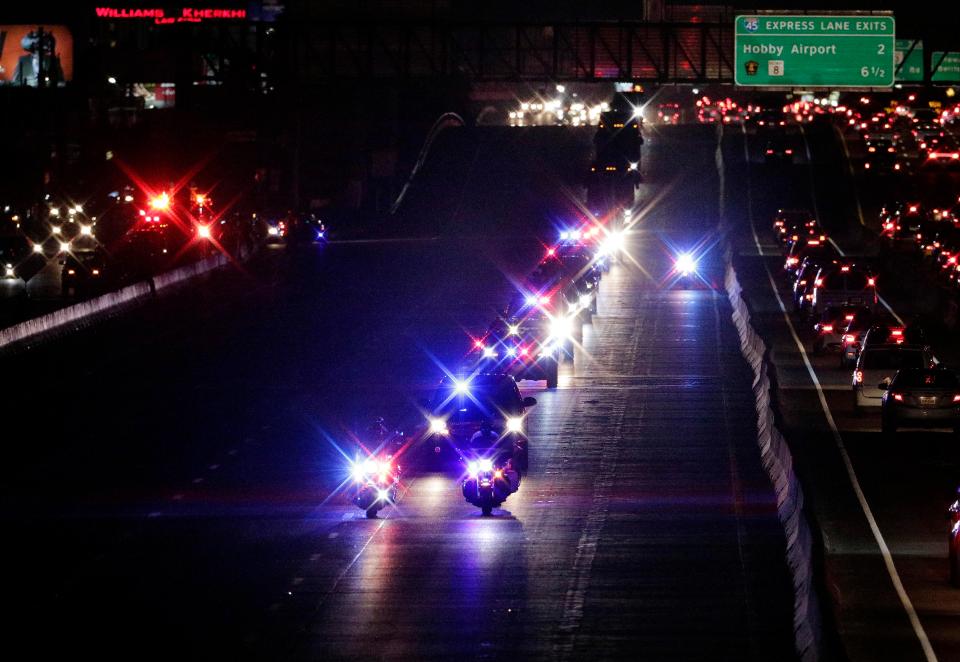  The motorcade carrying the body of former president George HW Bush travels to the church