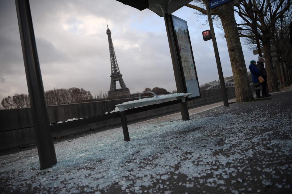  Broken bus stop, with the Eiffel Tower in the background: December 9