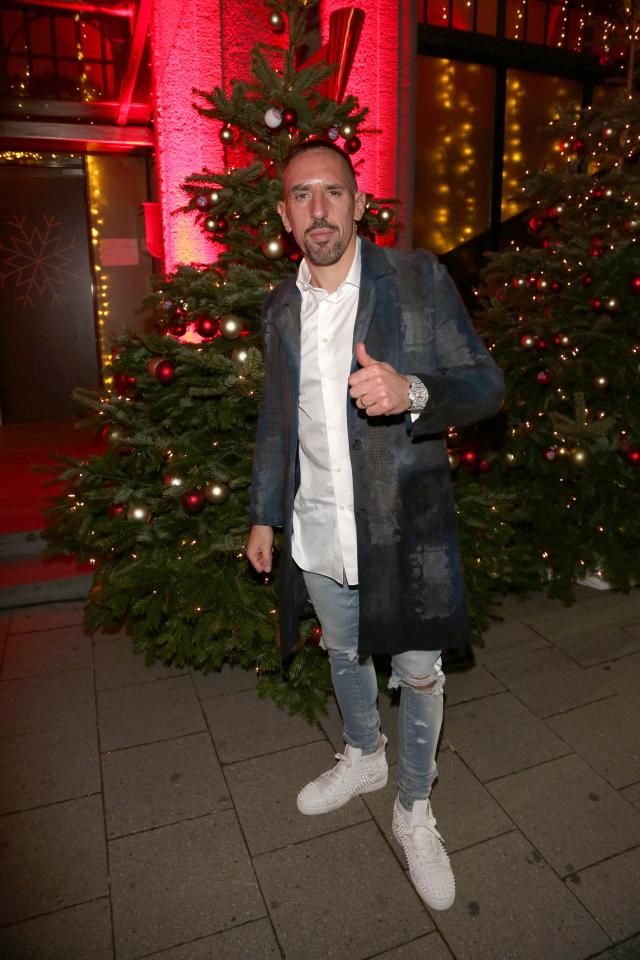  Franck Ribery looking casual wearing ripped jeans and a white shirt