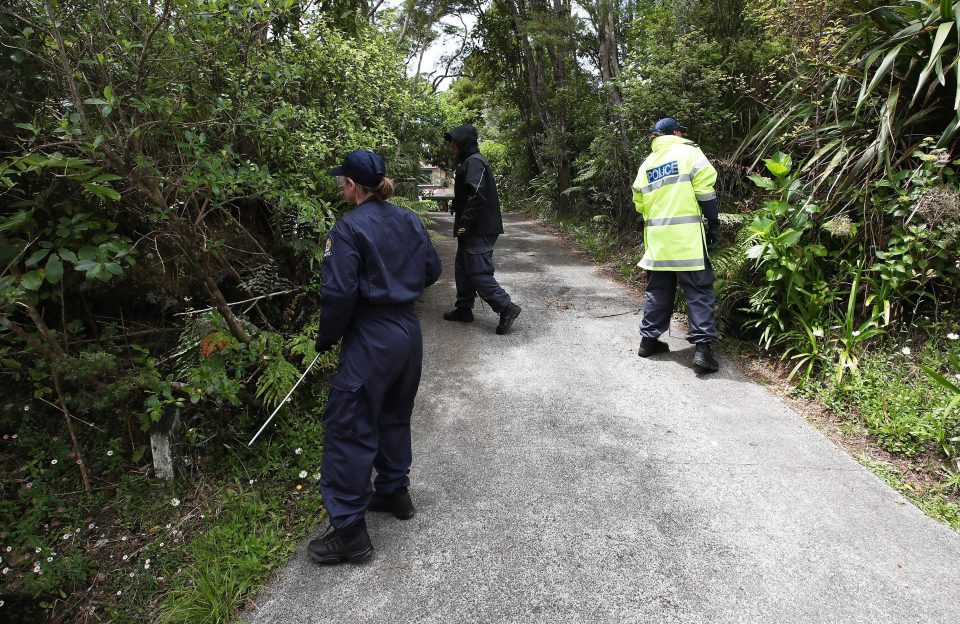  Cops search the forest following the discovery of Grace's body