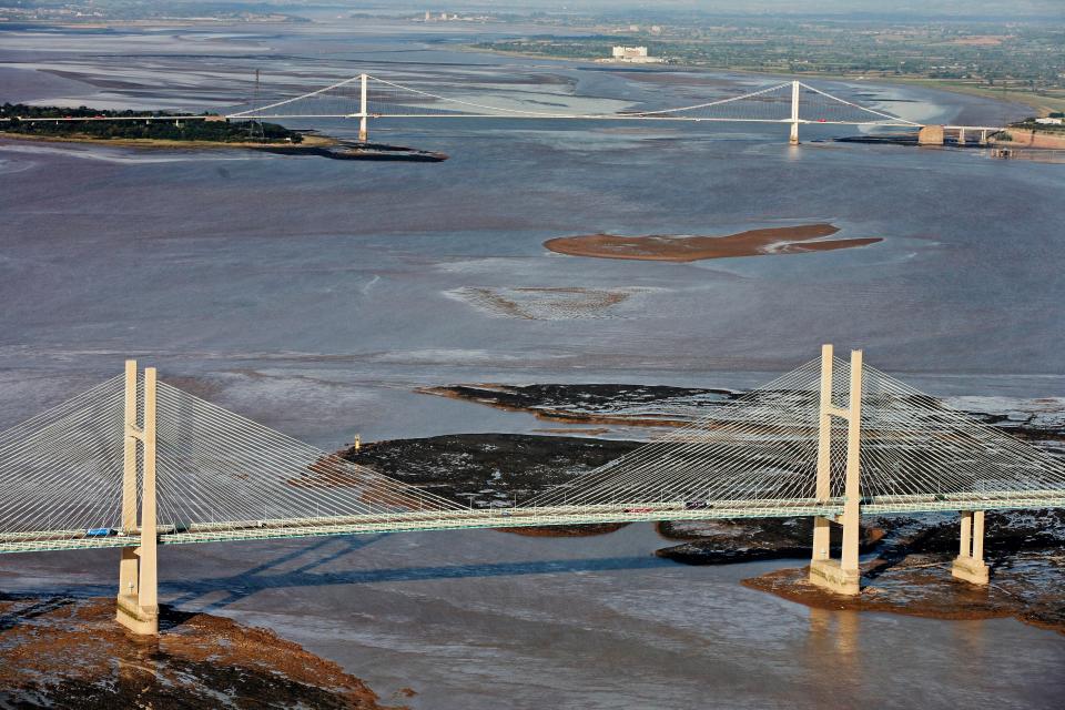  The waters of the Severn River under the old and new bridges