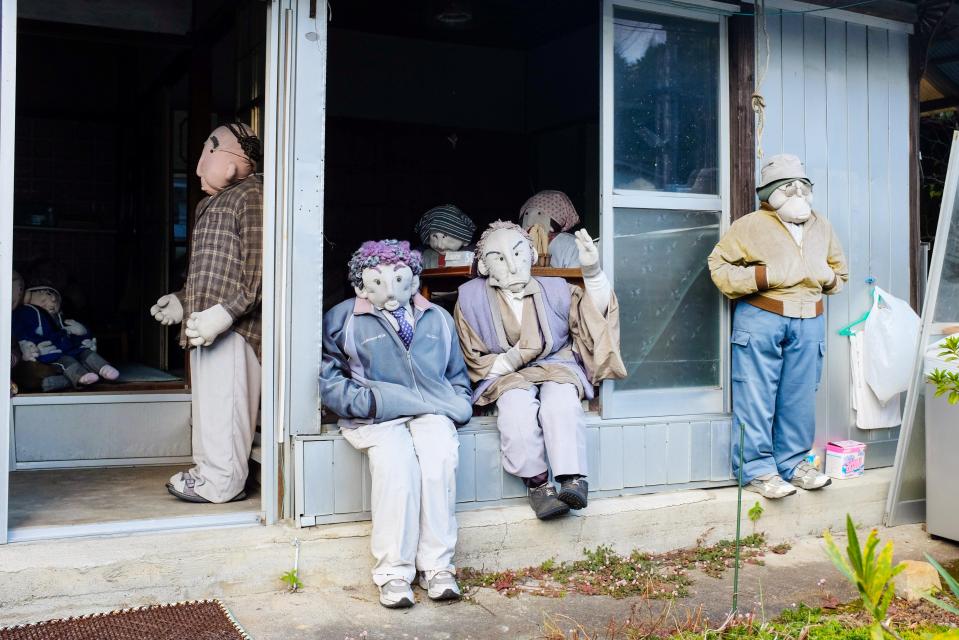  This is an eerie Japanese village where mourners place life-size dolls outside their homes in tribute of their loved ones