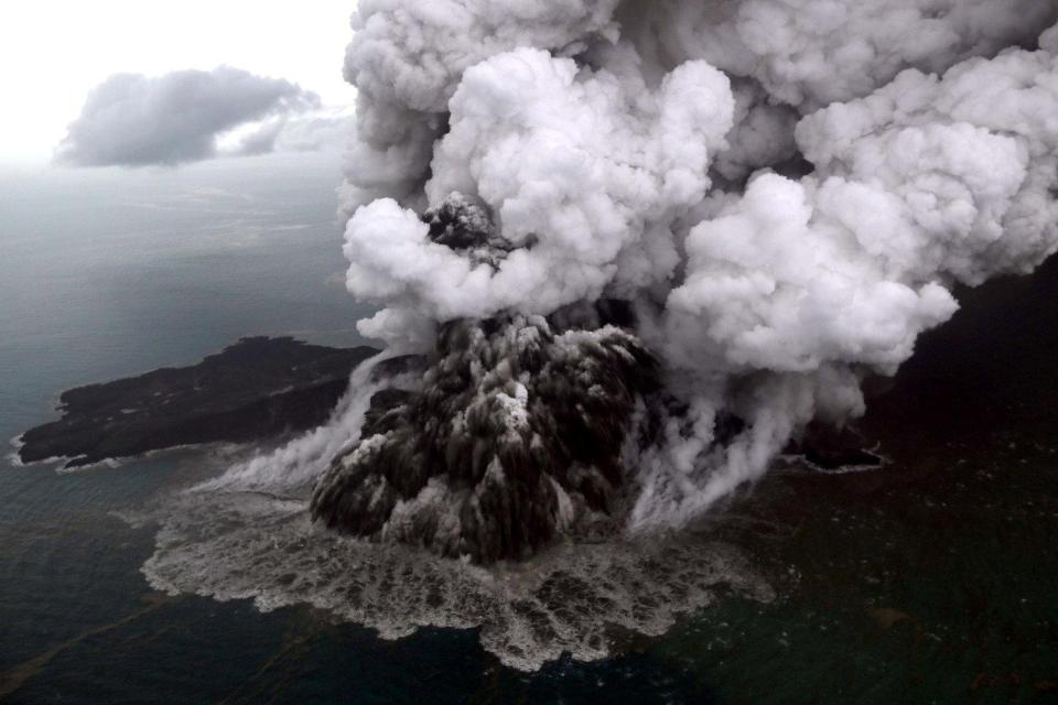  A huge ash cloud billows out over Anak Krakatau, whose eruption caused the tsunami