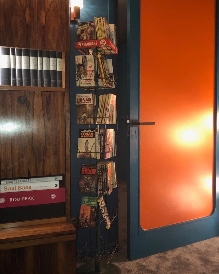  He has rack upon rack of comics... and there's also a games room