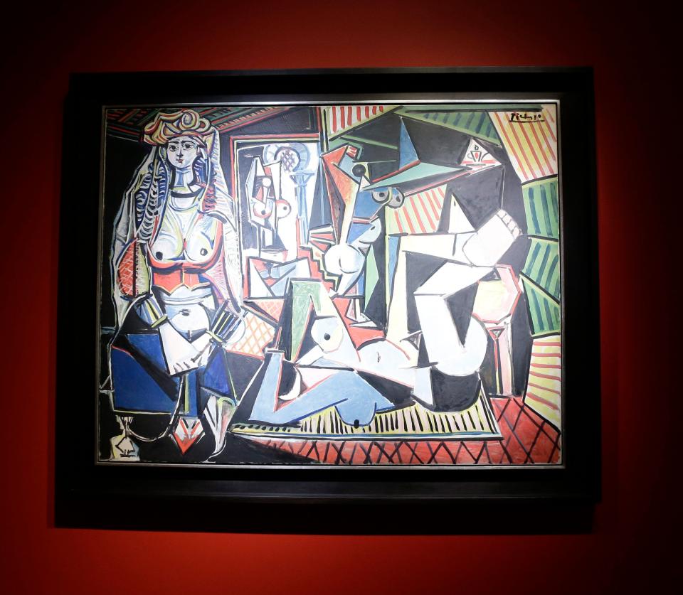 The "Les femmes dAlger" painting by Picasso appears as an example on the scam firm website