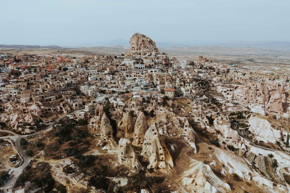  Uchisar Castle in Turkey - a hive of caves bored into the rock