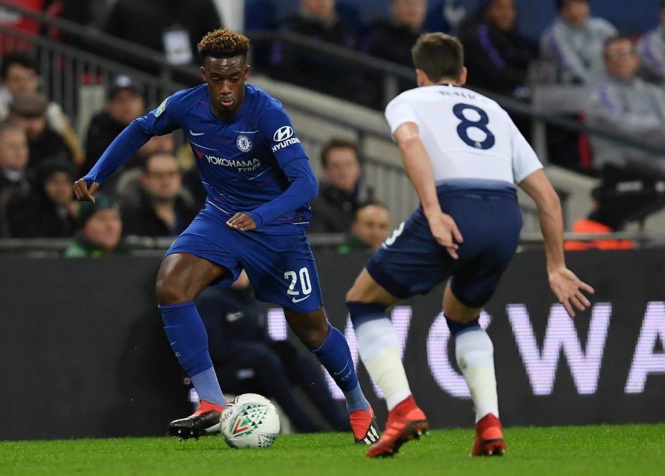 Chelsea ace Callum Hudson-Odoi skips past the challenge of Spurs midfielder Harry Winks