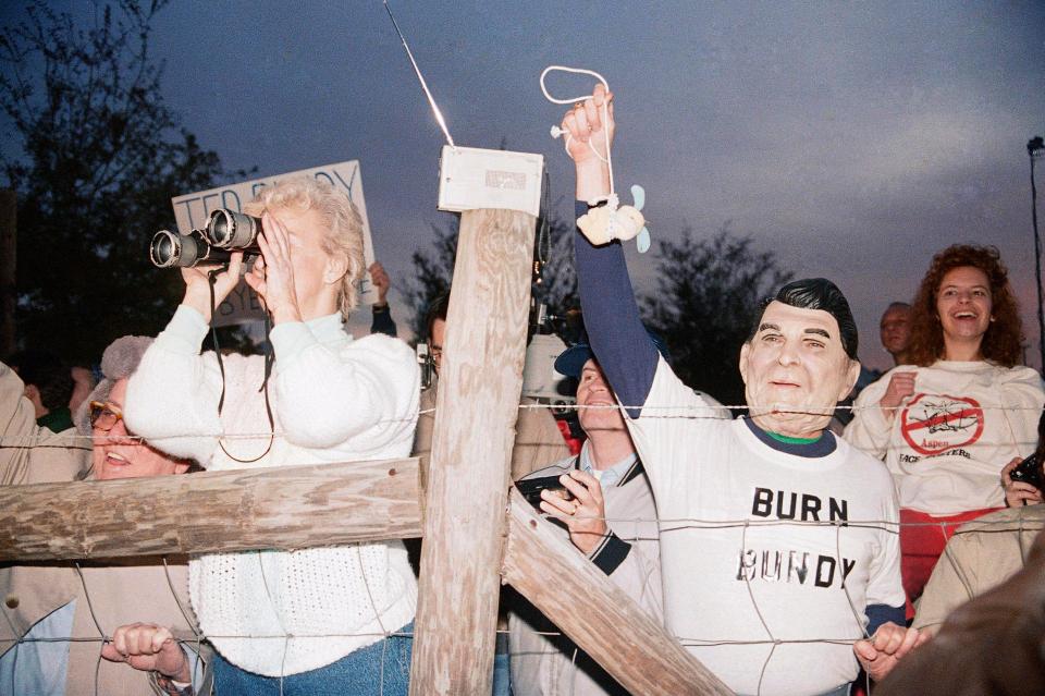  A pro-death penalty crowd rejoice after Bundy's execution in 1989 at sunrise