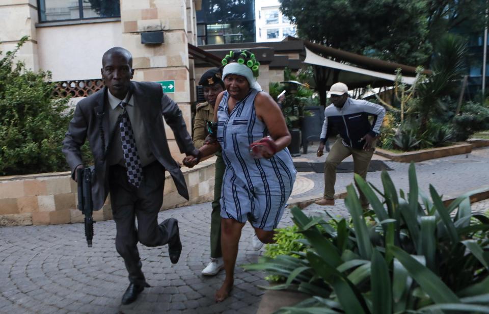  Survivors run to safety during the horrific attack