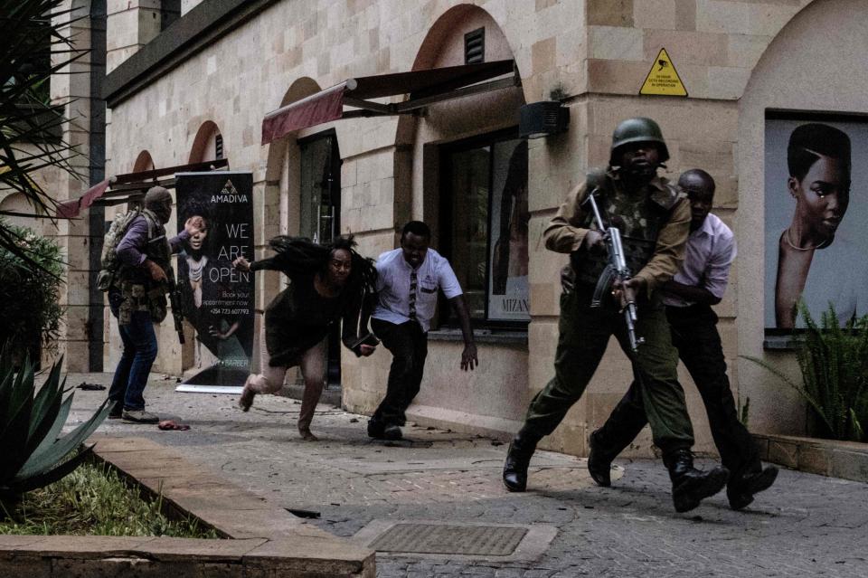 Moments later a set of hostages are freed