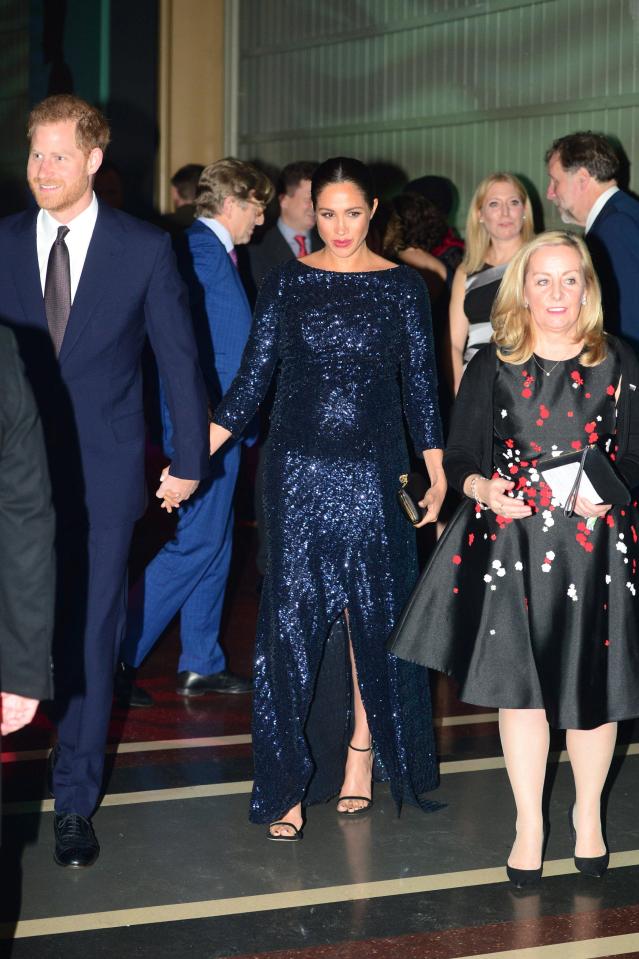  Prince Harry and Meghan Markle held hands as they arrived at the Royal Albert Hall