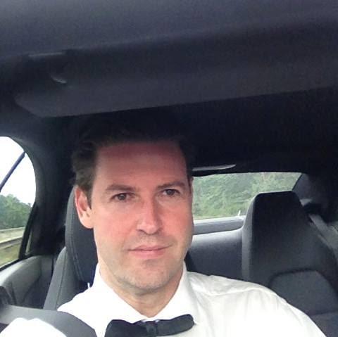  McGrath living out his 007 fantasy in bow tie at the wheel of a flashy £50,000 Maserati Alternative Text