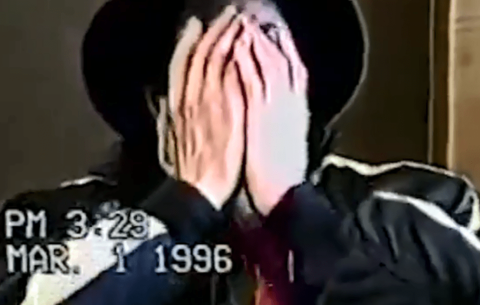  Jackson put his face in his hands after being asked whether he'd molested a child