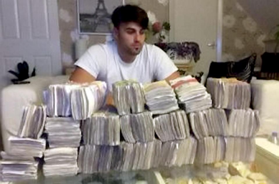 Olsi Beheluli, posing with £240,000 of cash on Twitter, was jailed for 11 years in 2015 after more than £4million of cocaine and heroin was seized from his North London Albanian gang
