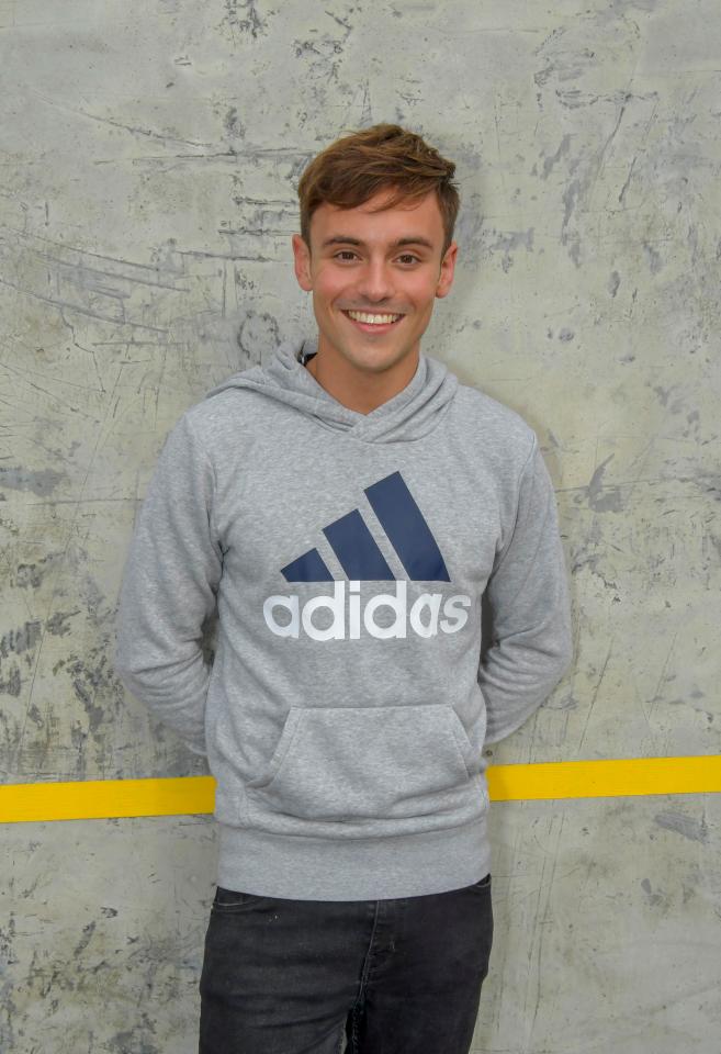  Tom Daley showed off his winning smile too
