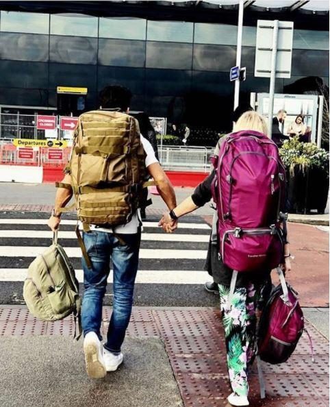 Carley Stenson and Danny Mac leave for their honeymoon