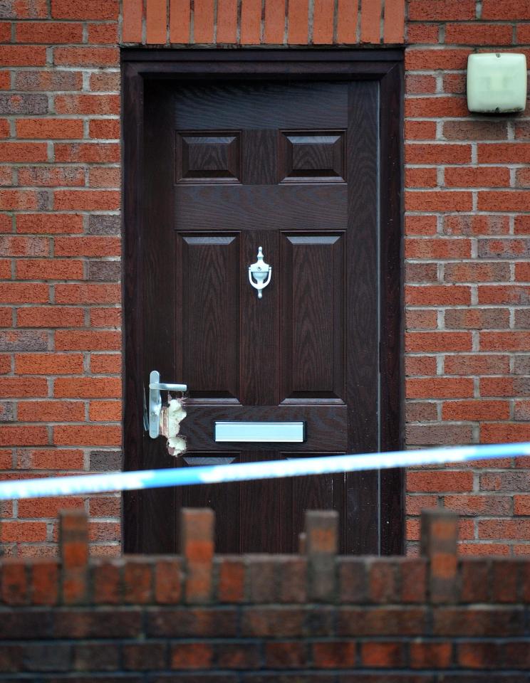  A shot war fired at a property in Manchester, blasting a hole through the front door