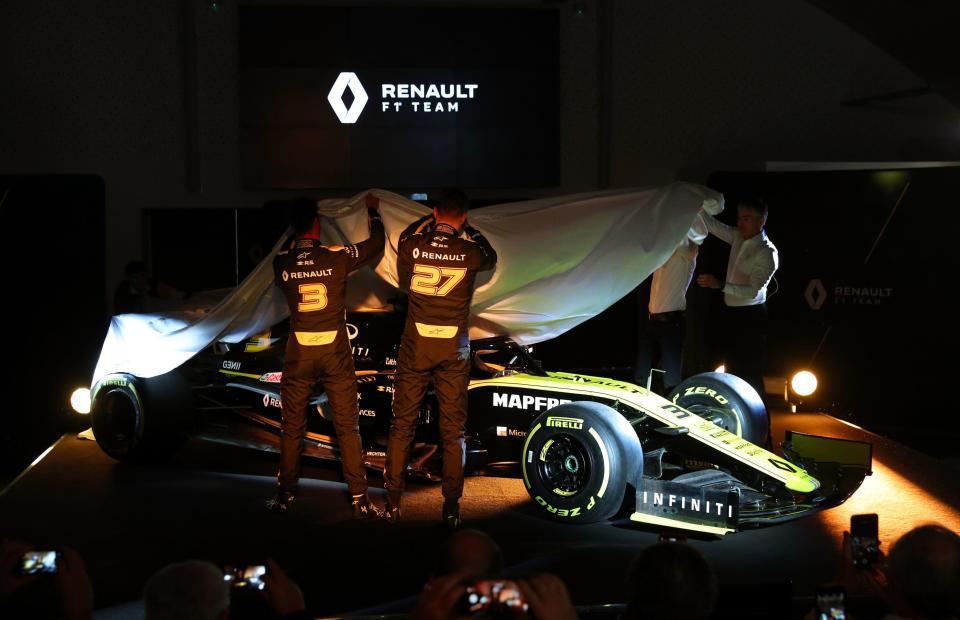 Renault mechanics unveil the latest car which Ricciardo will be desperate is more reliable than his Red Bull last year
