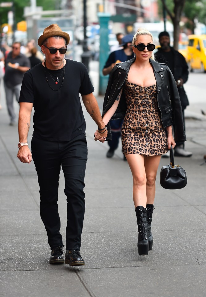  Gaga pictured with ex-fiance Carino last June