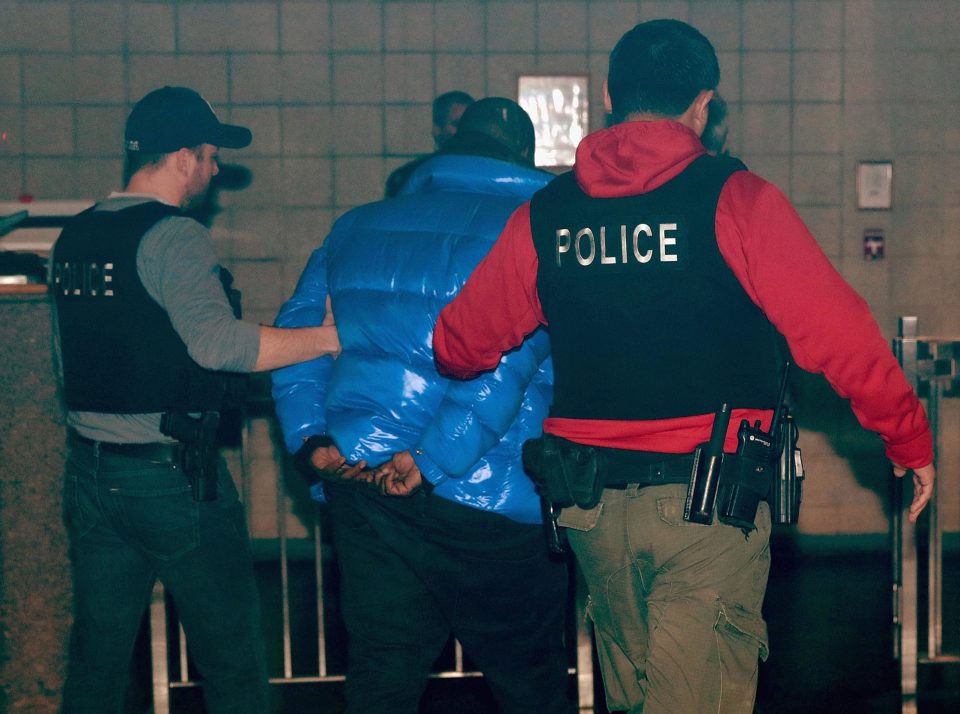  The R&B singer was led away in cuffs and is due to appear in court on Saturday