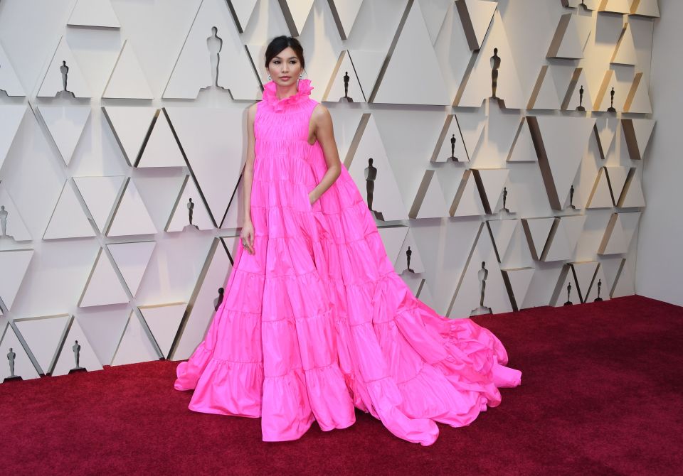  It's hard for Crazy Rich Asians actress Gemma Chan to look bad in anything, but we aren't sure about this bright pink floaty Valentino dress that slightly resembles a duvet