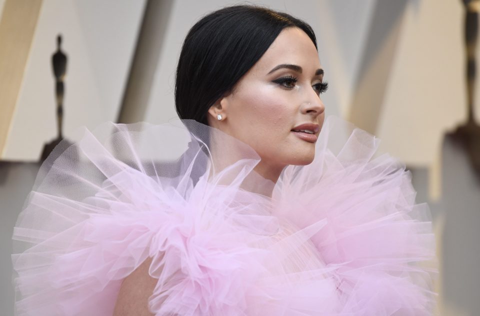 Kacey looked like she was slightly drowning in the poofy pink number