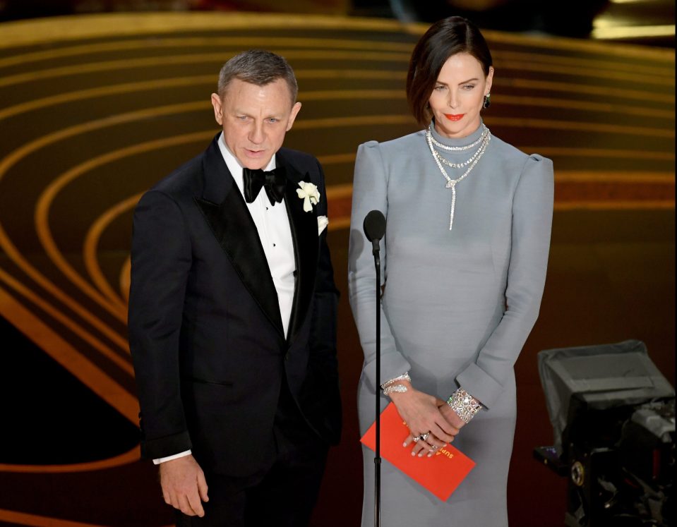  Daniel Craig and Charlize Theron presented the Best Supporting Actor award