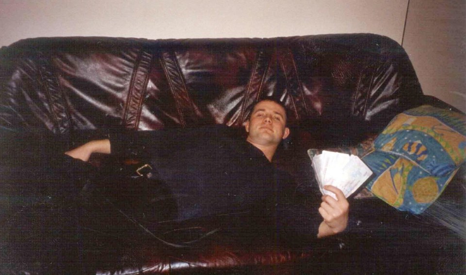 Plakici, jailed for 23 years, was pictured posing with bundles of cash