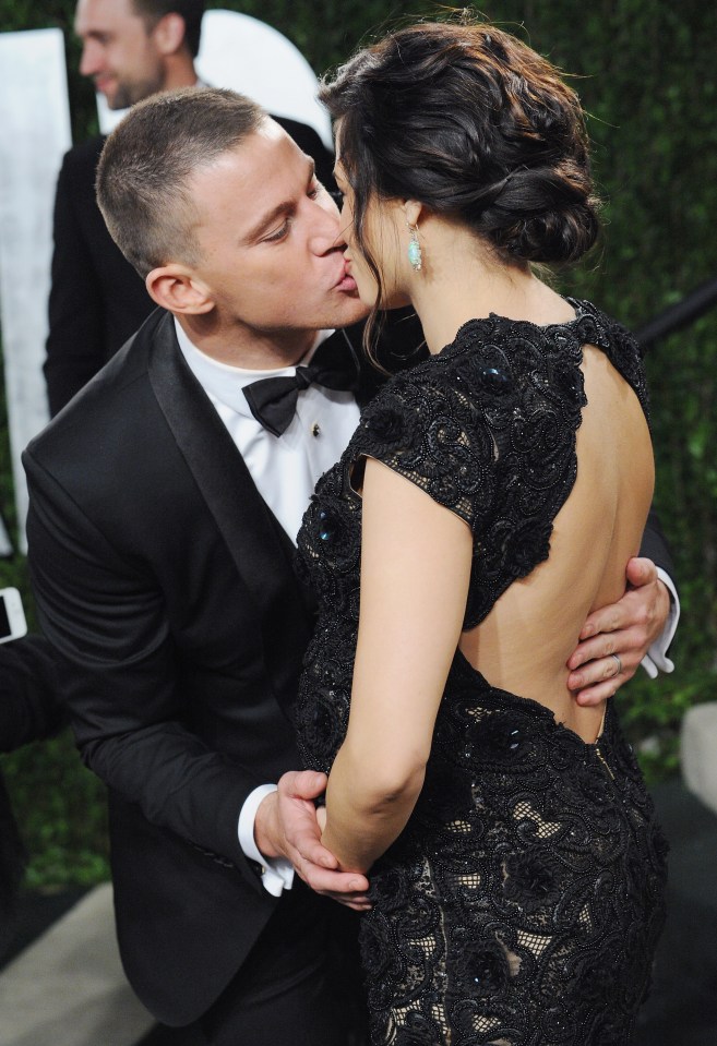  Channing Tatum appears desperate to get a peck of his then-pregnant-wife Jenna Dewan at the Vanity Fair Oscars Party in 2013