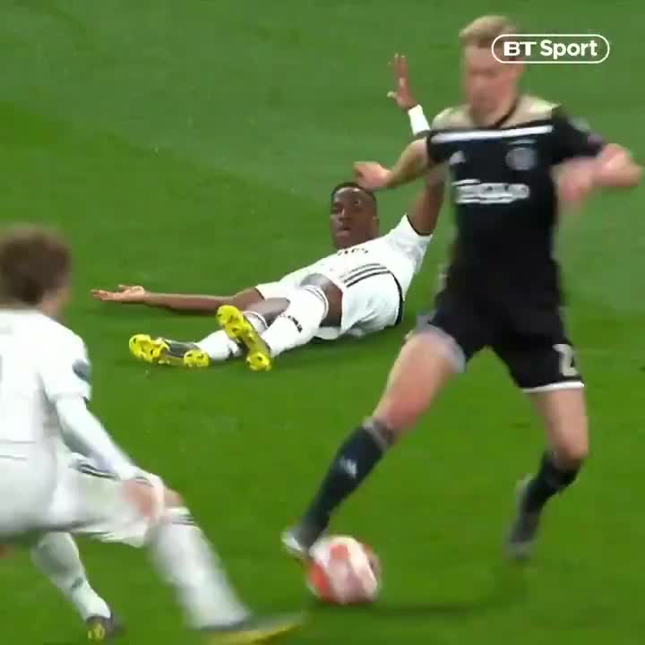 Real Madrid's Ballon d'Or winner Luka Modric went in to try and halt Frenkie De Jong's progress