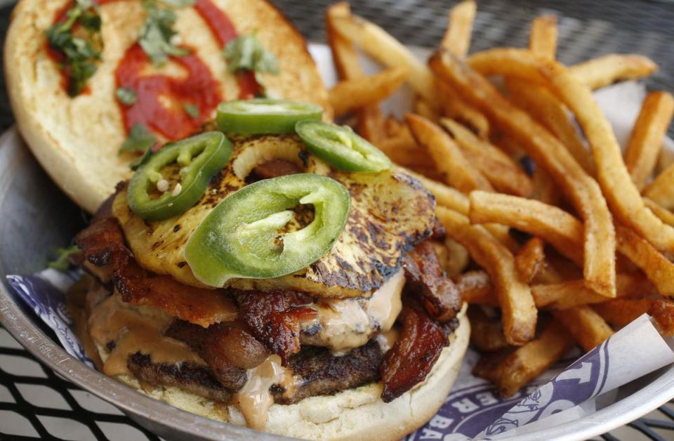 The pilot bought 70 burgers from Fat Guy’s Burger Bar in Tulsa