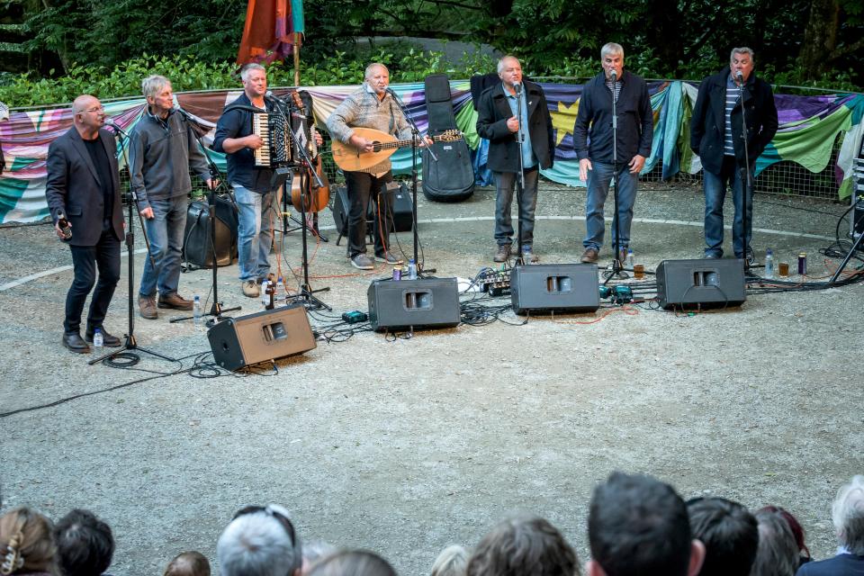 The band, most of whom are in their 60s, appear as extras in the film