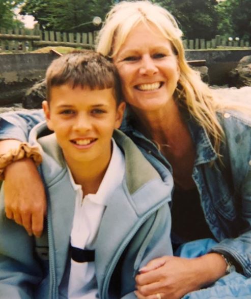  Mike pictured as a child with his mum