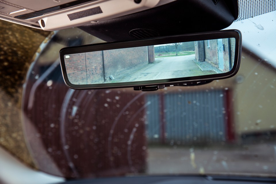 Look carefully at the photo of the rear-view mirror and you’ll see it’s switchable between a conventional mirror and a rear-view camera screen