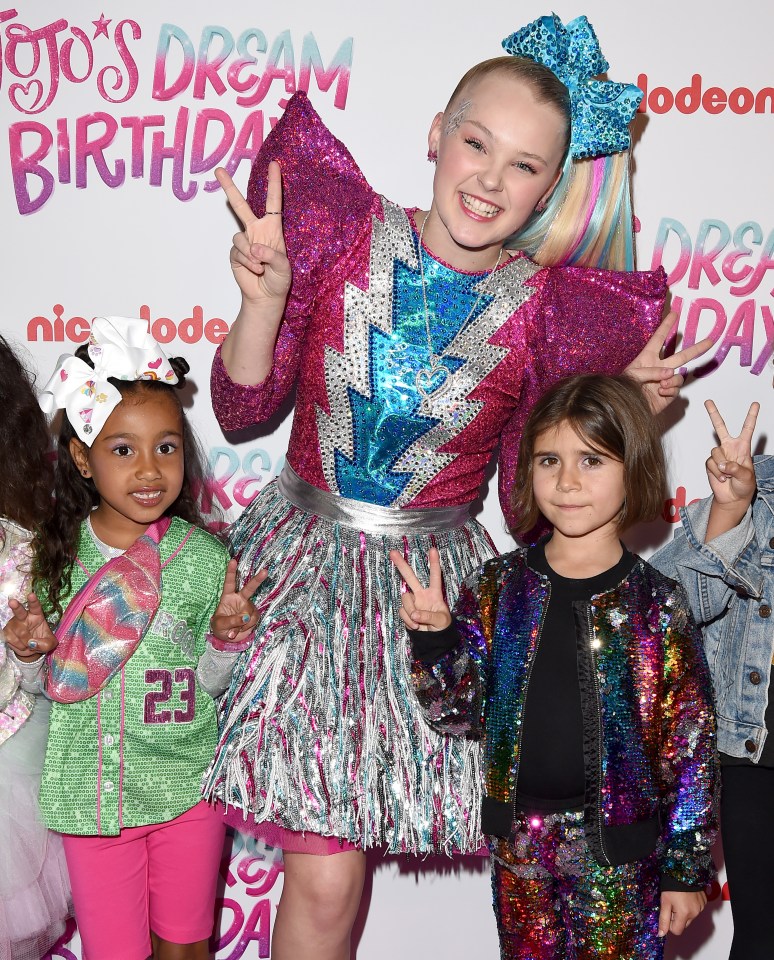  The teen superstar poses with North West and Penelope Disick at her star-studded Sweet Sixteen bash