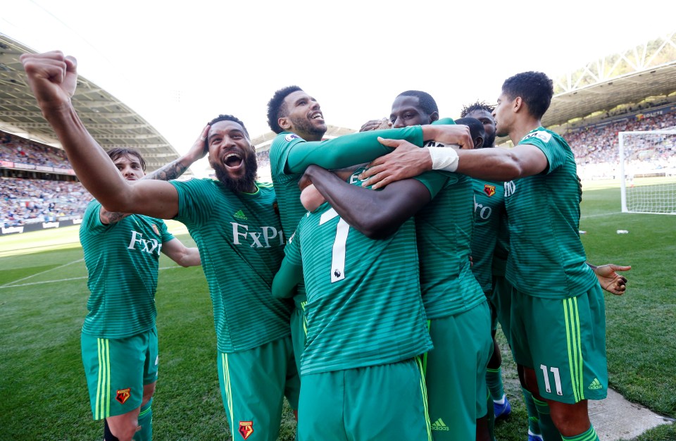  Watford's players celebrate as Deulofeu secures the points