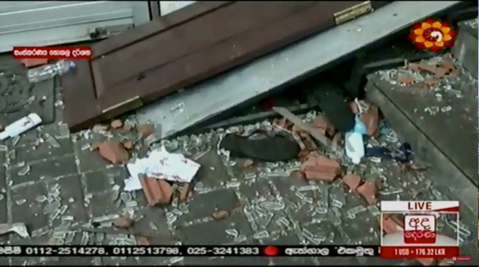  Rubble and destroyed building fragments were blasted onto the street in suspected bombings