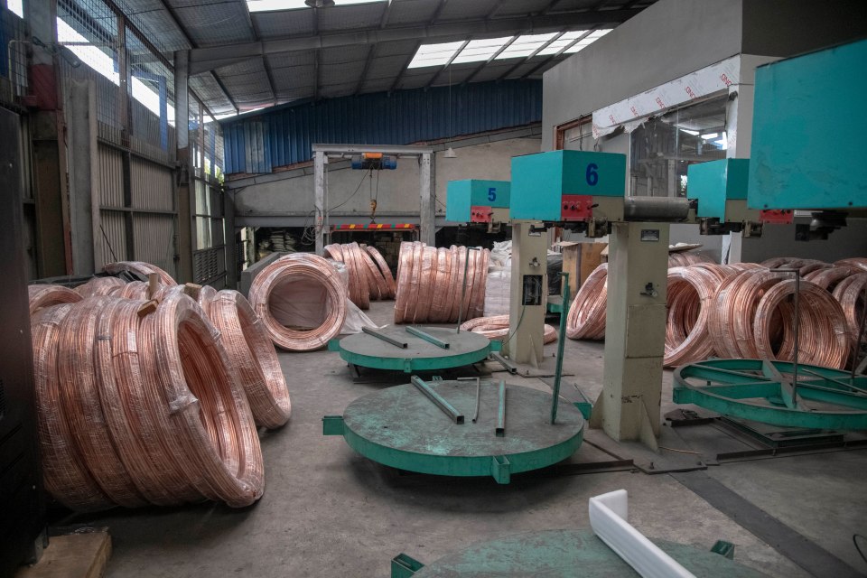  Some of the low-paid workers at the factory insist they did not know about the plot or their employer's extremism