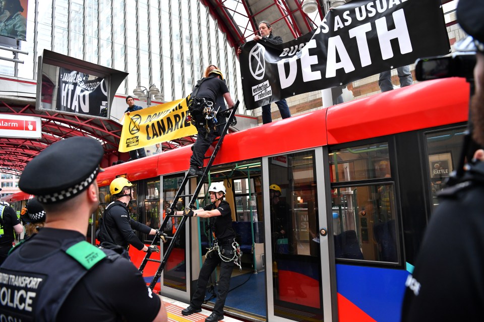  Police eventually removed the protesters from the top of the train