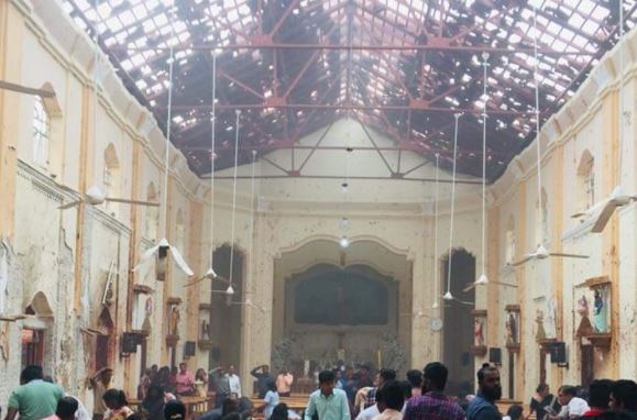 Dramatic photos from inside St Anthony's church shows how tiles from the roof smashed to the ground in the explosion