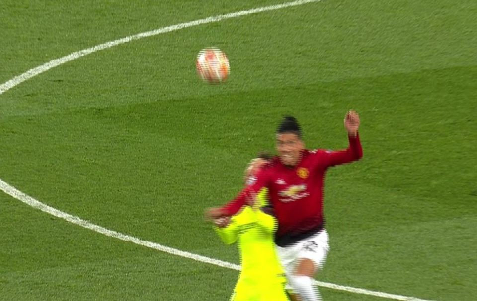 Smalling showed no mercy as he clattered Messi during an aerial challenge